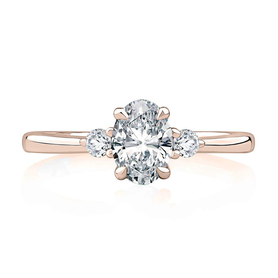 Oval Three-Stone Four-Prong Diamond Engagement Ring