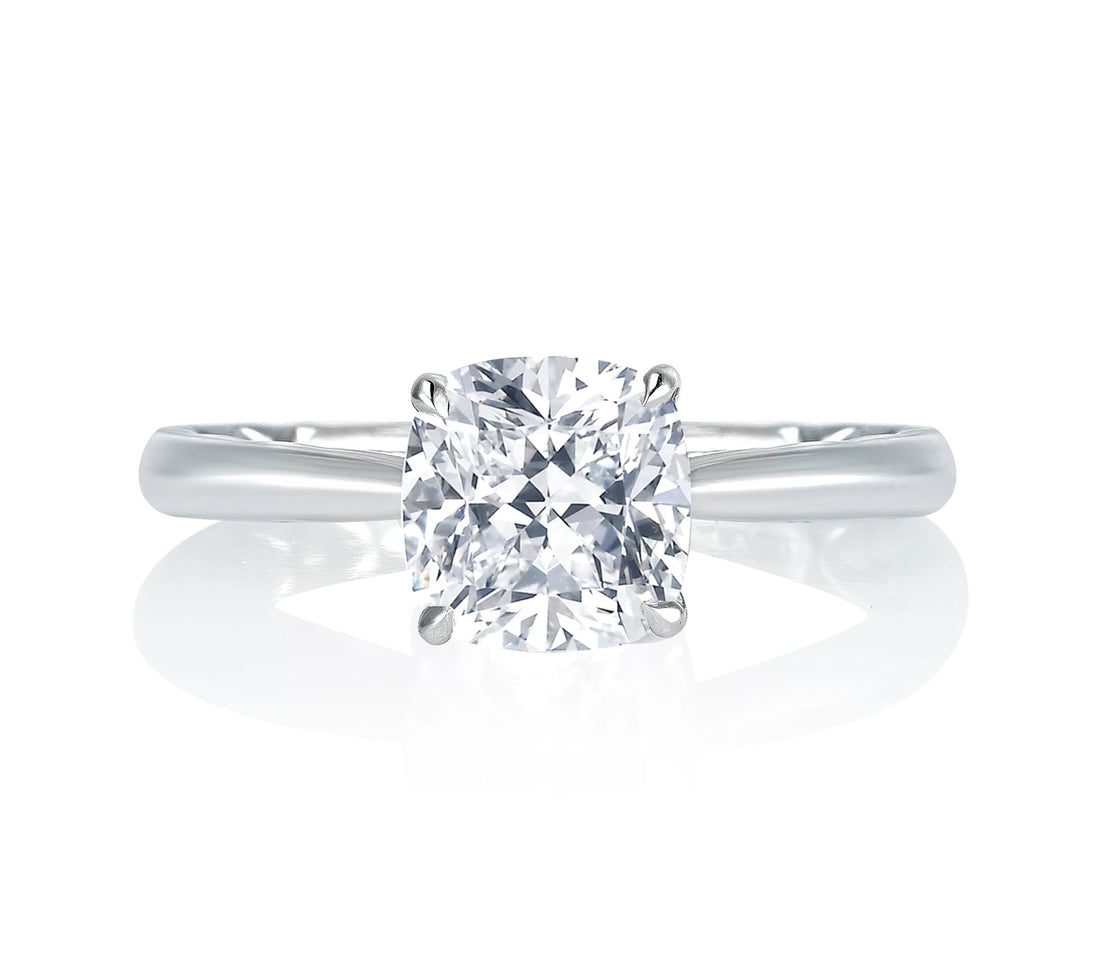 Round Solitaire Four-Prong Diamond Engagement Ring