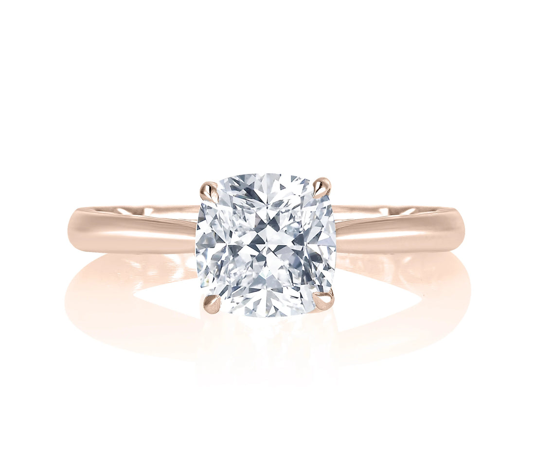 Round Solitaire Four-Prong Diamond Engagement Ring
