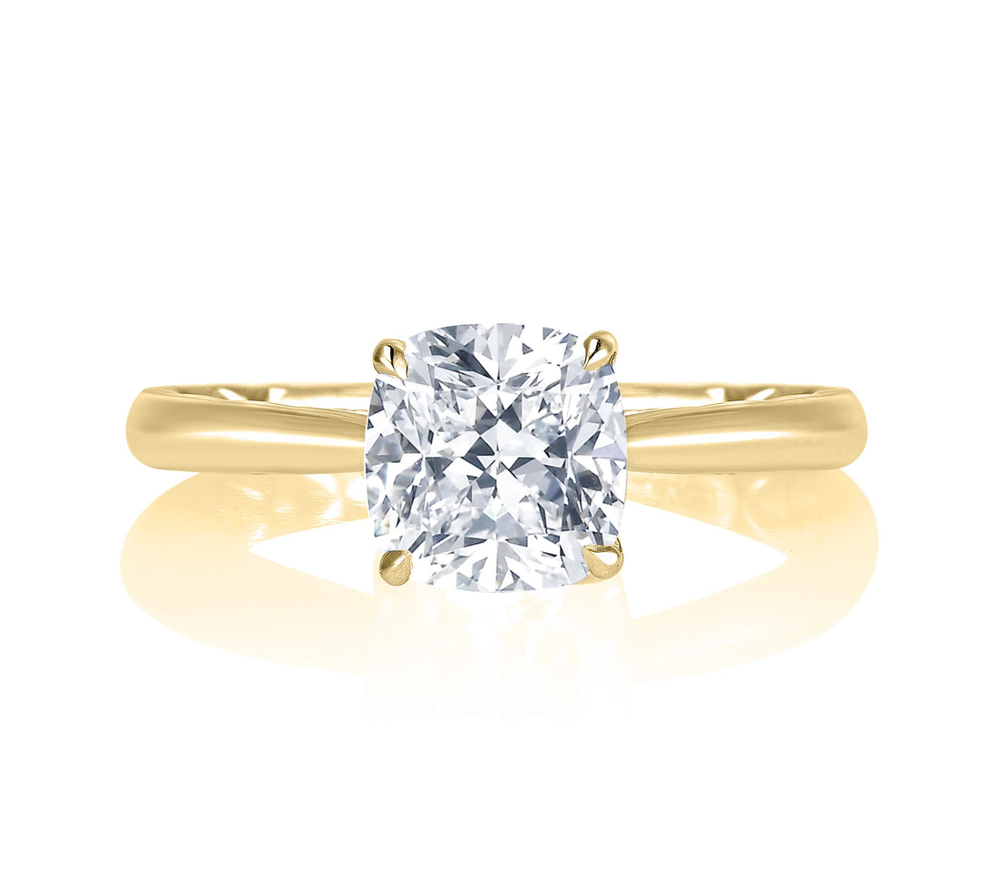 Round Solitaire Four-Prong Diamond Engagement Ring